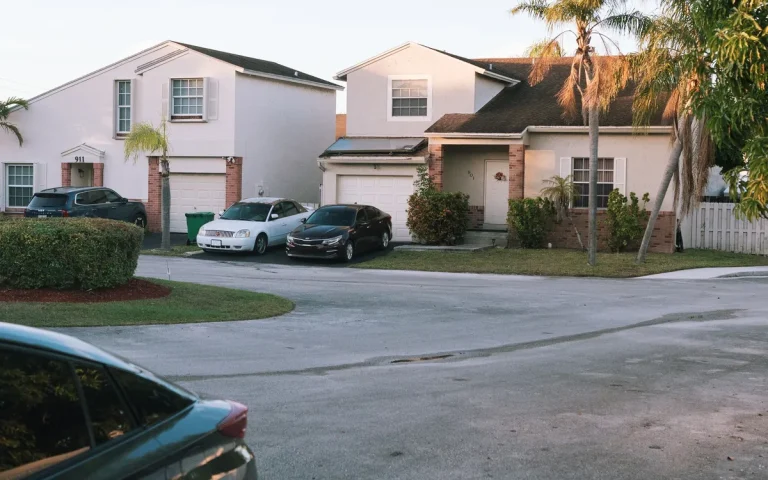 Townhomes on a palm-lined street, plumber in Hialeah Gardens, FL